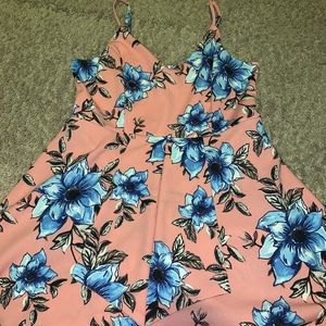 a white and blue romper